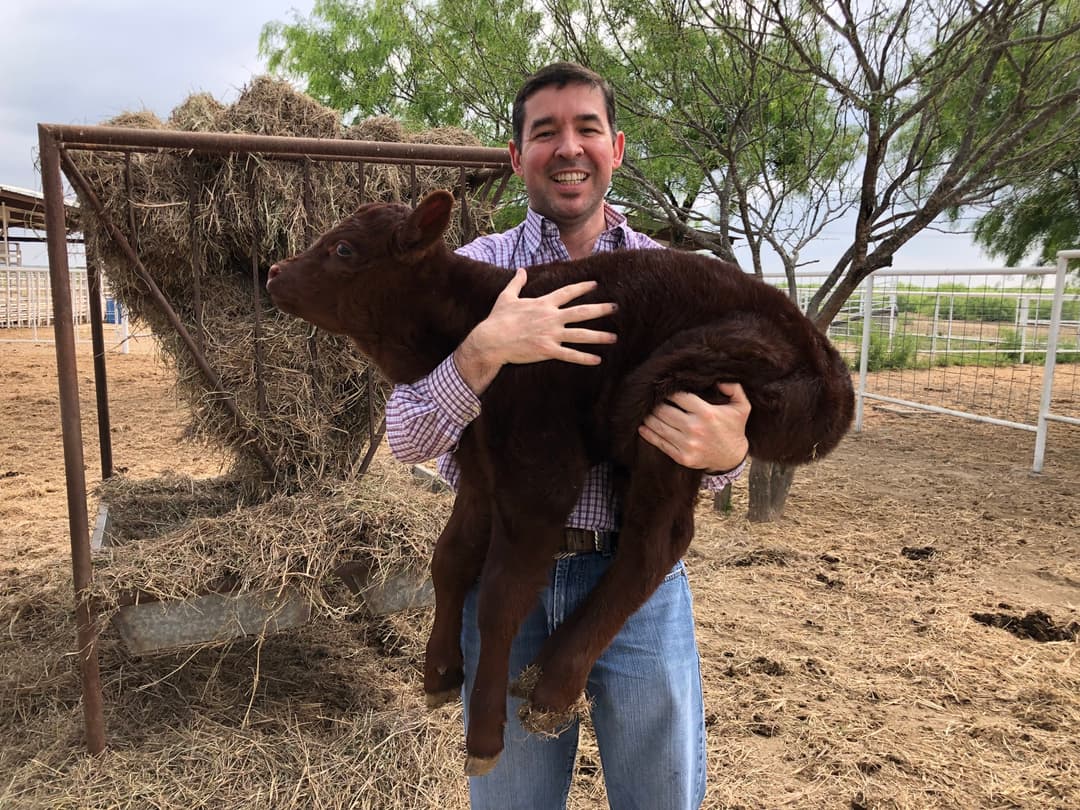 Family celebrating their successful deer hunt together